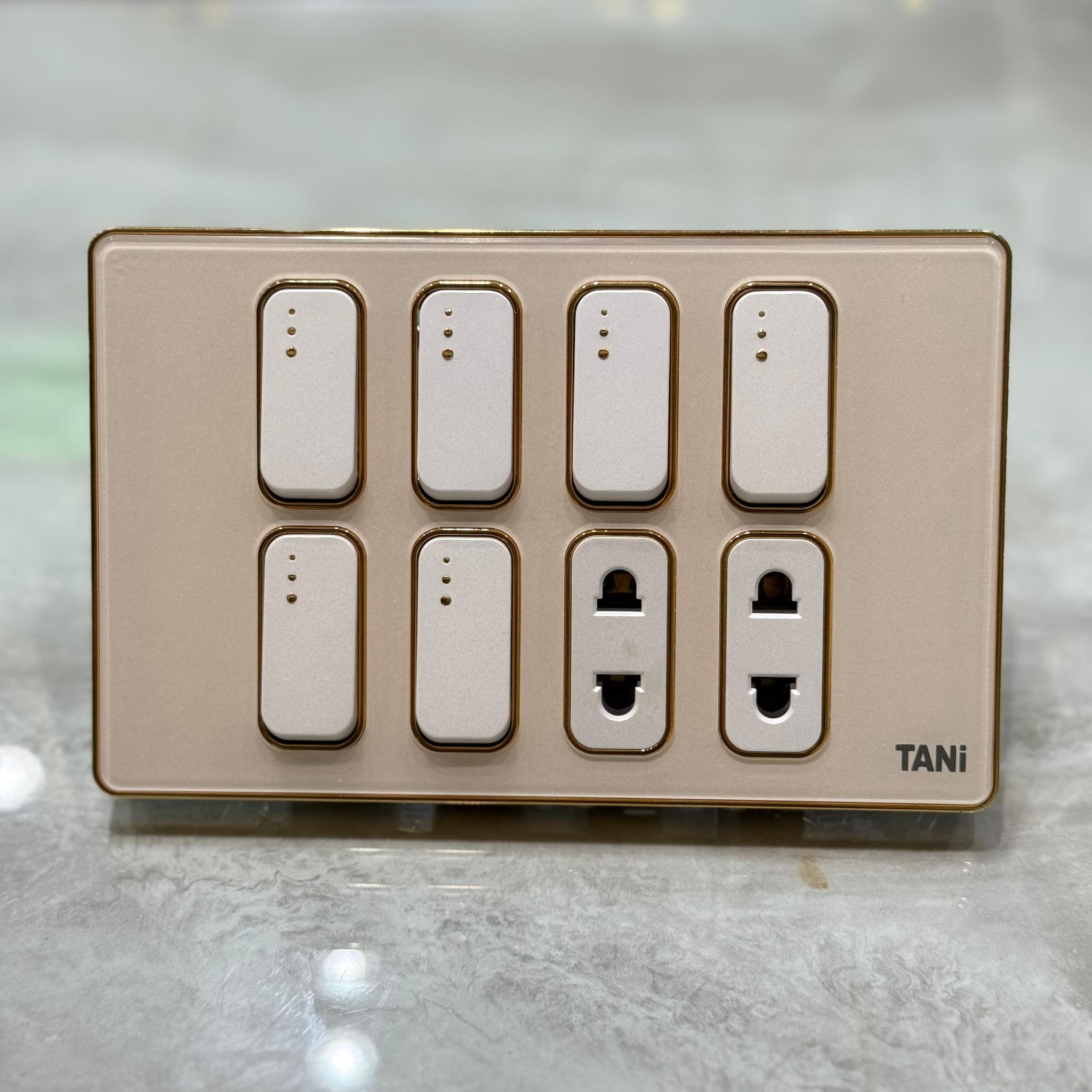 TANi Champagne Gold 8-Gang Modular Switch Panel with Universal Sockets – Premium Glossy Series | Qintar Electric